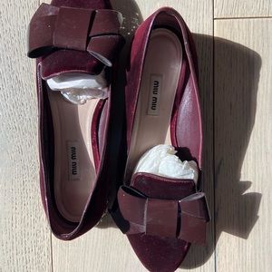 Miu Miu maroon loafers with bow